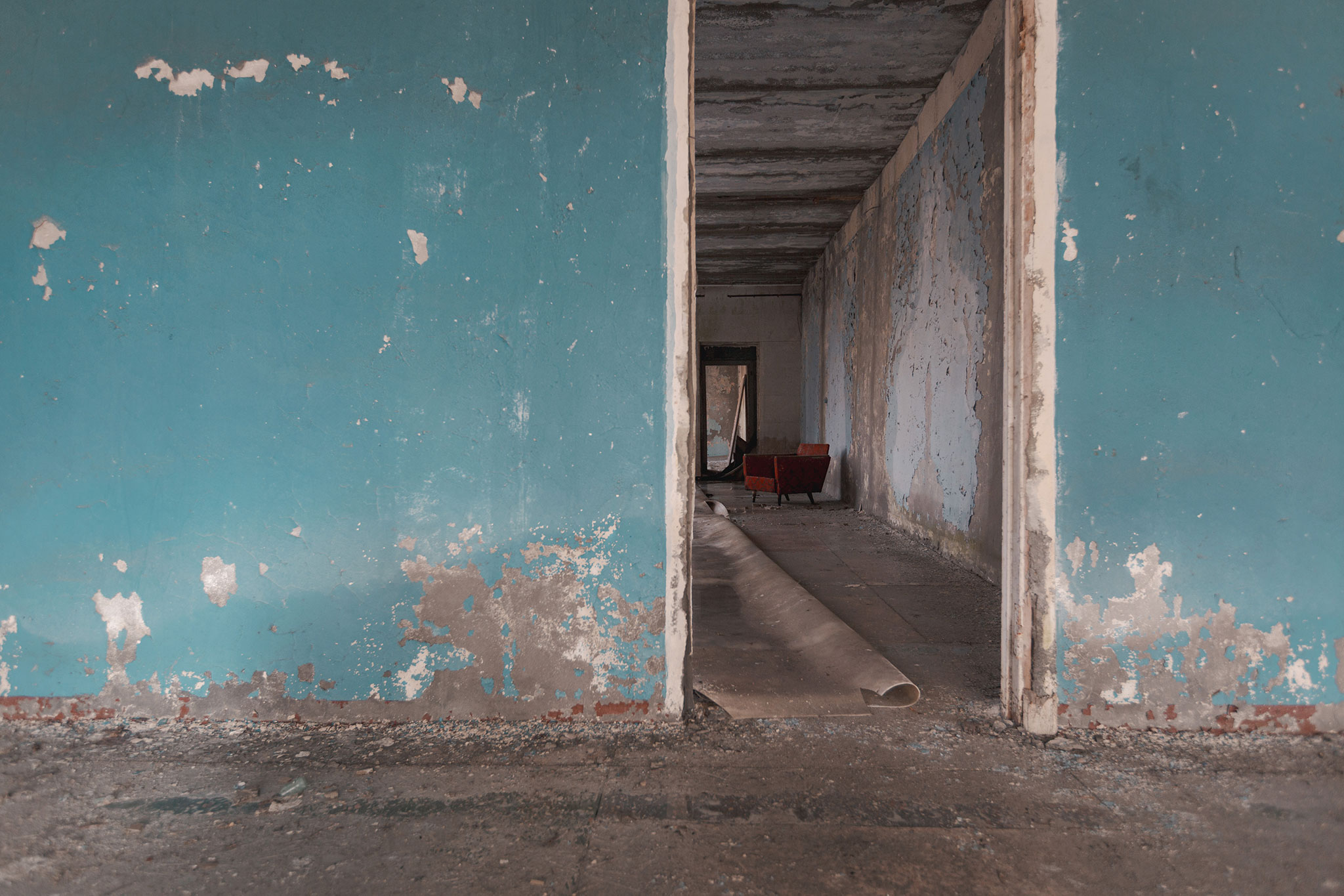 · Blue Wall Red Chair ·